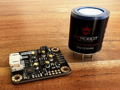 DFRobot SEN0466 signal conversion board next to the CO probe